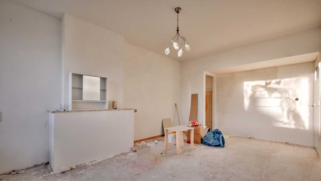 A spacious room under renovation Fix-and-flip-project-in-Honolulu-before-starting-renovation