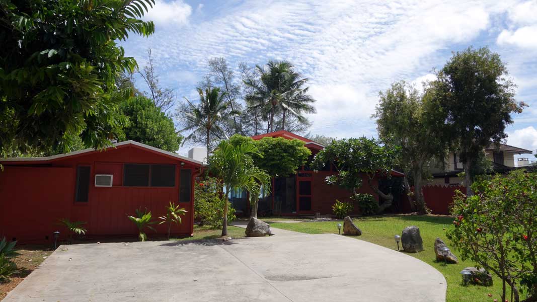 Front yard of Waimanalo Beach House Oahu home before renovation begins