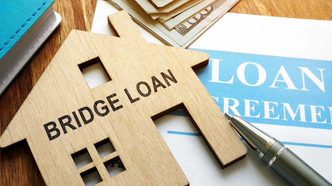 Bridge loan and mortgage agreement with pen.